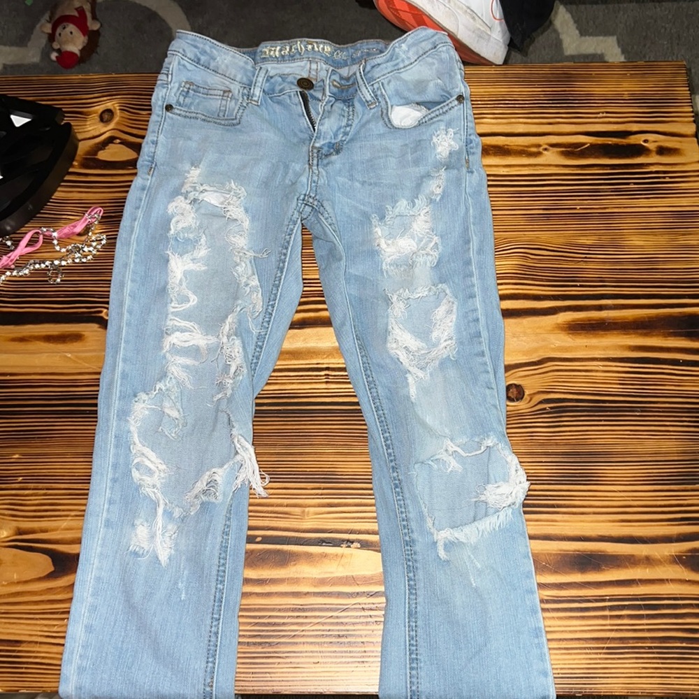 light blue ripped jeans